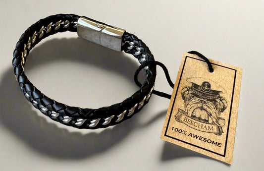 A braided leather bracelet with a stainless steel magnetic clasp. This bracelet comes in a Beecham gift box brought to you by kenny k.&nbsp;