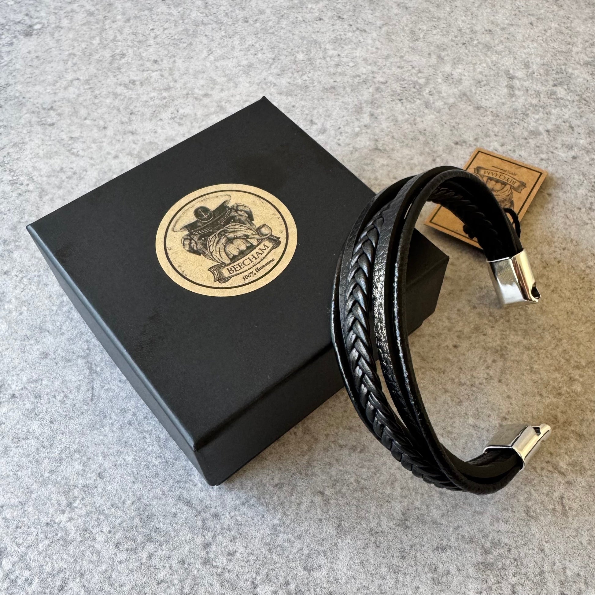 rafted with premium black leather, the Beecham bracelet combines sophisticated style with everyday wearability. The elegant silver clip closure ensures a secure fit while maintaining a refined aesthetic. This men's accessory is completely lead and nickel free, making it suitable for sensitive skin and all-day comfort. Brought to you by kenny k.&nbsp;