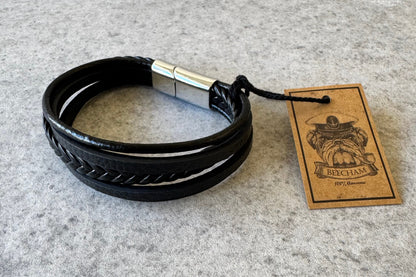 rafted with premium black leather, the Beecham bracelet combines sophisticated style with everyday wearability. The elegant silver clip closure ensures a secure fit while maintaining a refined aesthetic. This men's accessory is completely lead and nickel free, making it suitable for sensitive skin and all-day comfort. Brought to you by kenny k.&nbsp;