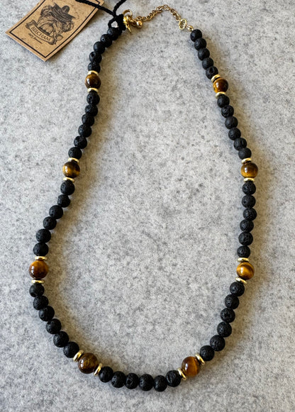 Beecham necklace brought to you by kenny k., &nbsp;the perfect gift for the laid-back guy in your life! This necklace is not only awesome, it's an awesomely fashionable way to show off his style. Presented in a Beecham gift box. Tigers Eye Lava Stone.