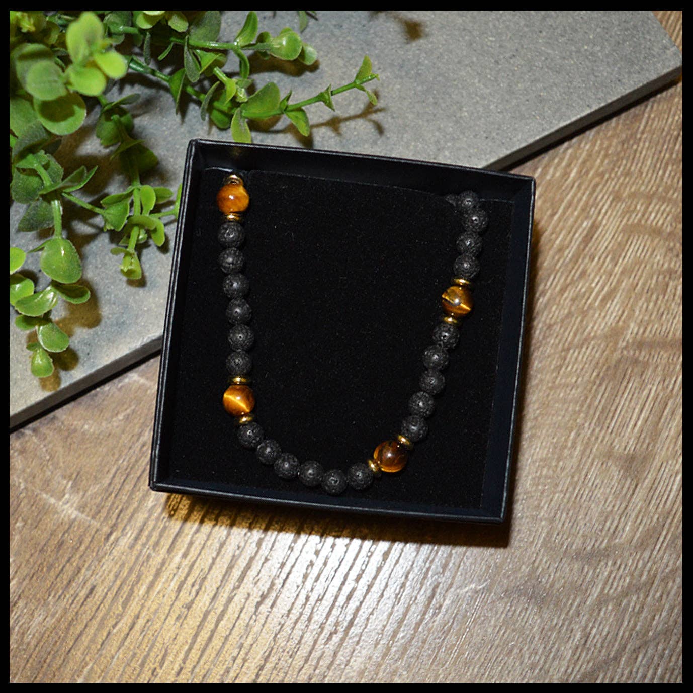 Beecham necklace brought to you by kenny k., &nbsp;the perfect gift for the laid-back guy in your life! This necklace is not only awesome, it's an awesomely fashionable way to show off his style. Presented in a Beecham gift box. Tigers Eye Lava Stone.