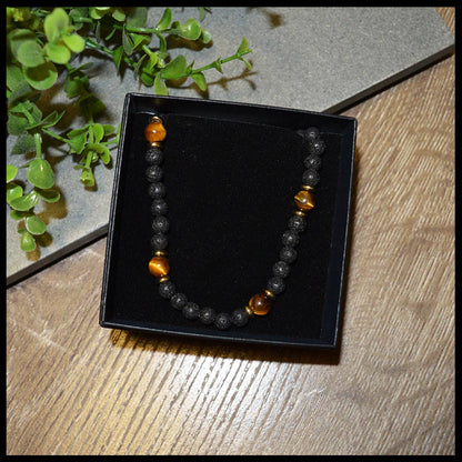 Beecham necklace brought to you by kenny k., &nbsp;the perfect gift for the laid-back guy in your life! This necklace is not only awesome, it's an awesomely fashionable way to show off his style. Presented in a Beecham gift box. Tigers Eye Lava Stone.
