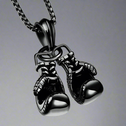For the sporting man. A black chain with a pair of boxing gloves. In a Beecham gift box brought to you by kenny k.&nbsp;