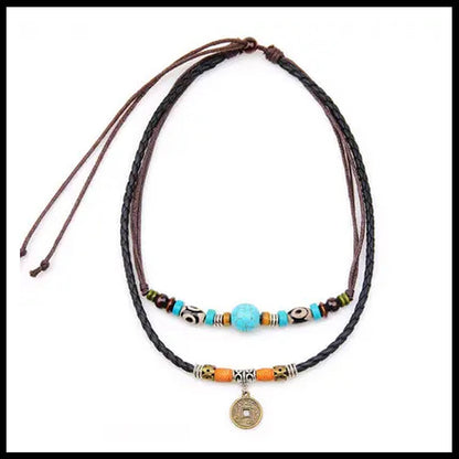 Crafted with premium leather and adorned with carefully selected beads, the Beecham Necklace brought to you by kenny k. embodies coastal elegance. This versatile accessory effortlessly elevates casual outfits with its relaxed, beachy aesthetic while maintaining a sophisticated edge. Perfect for layering or wearing as a statement piece for your sun-soaked adventures.&nbsp;