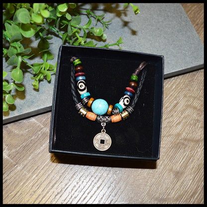Crafted with premium leather and adorned with carefully selected beads, the Beecham Necklace brought to you by kenny k. embodies coastal elegance. This versatile accessory effortlessly elevates casual outfits with its relaxed, beachy aesthetic while maintaining a sophisticated edge. Perfect for layering or wearing as a statement piece for your sun-soaked adventures.&nbsp;