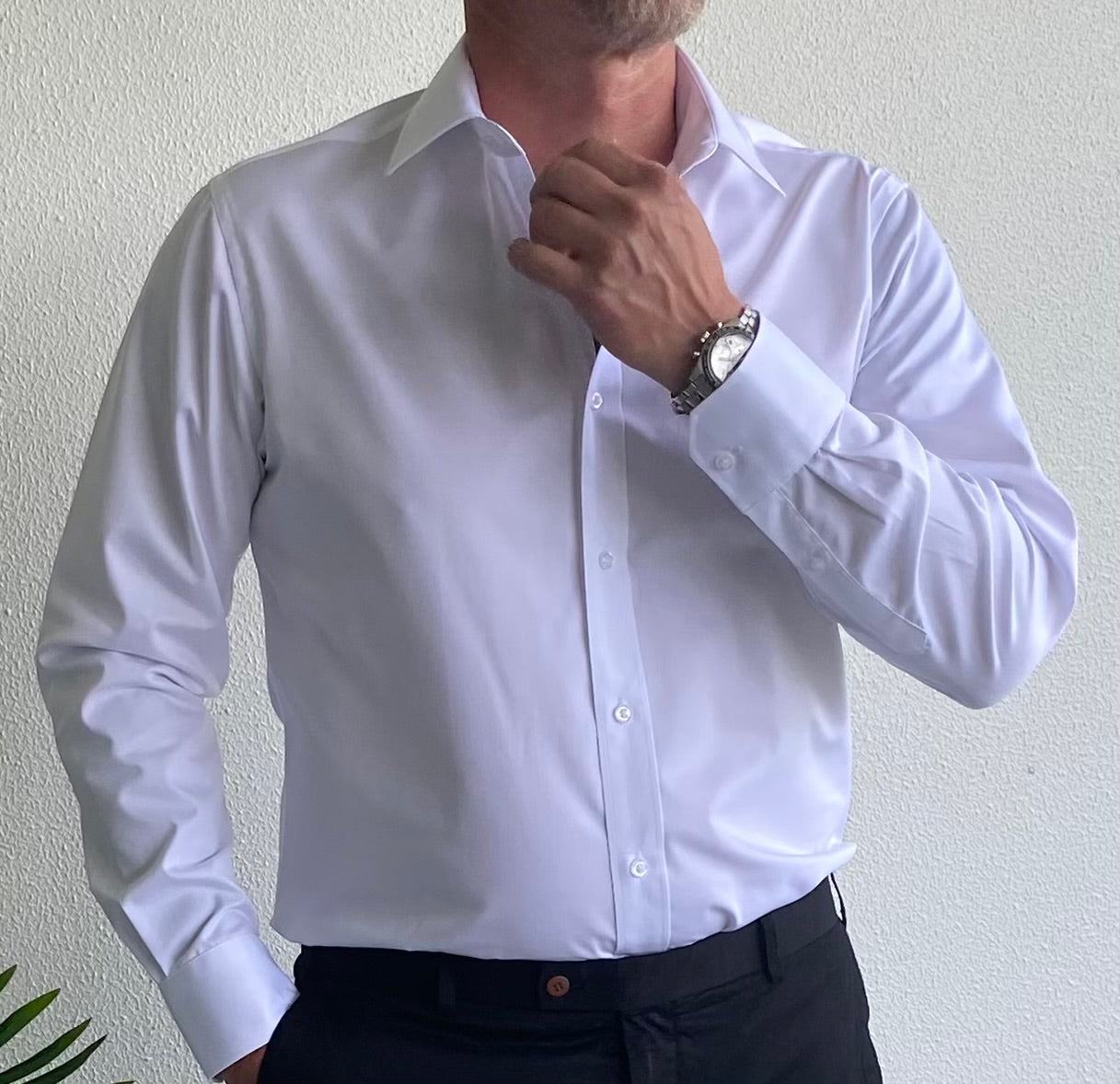 Experience the perfect combination of style and comfort with the Boston Slim Fit Business Shirt brought to you by kenny k. Made from a blend of cotton and polyester, this classic shirt is designed to offer a sleek and professional look while keeping you cool and comfortable all day. Expertly crafted to complement your business attire, it is a must-have for any wardrobe.&nbsp;
