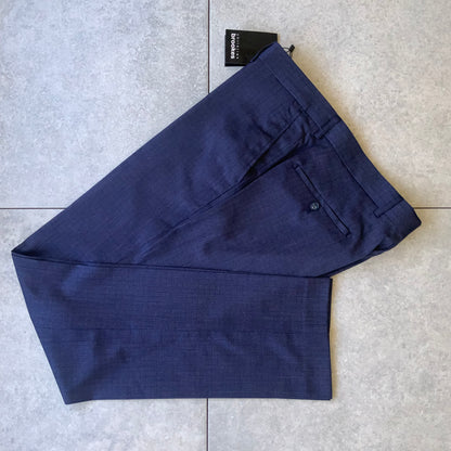 The Christian Brooks Cam Suite Trouser brought to you by kenny k. offers timeless style with a sharp, modern edge. Cut in a slim, tailored fit, these trousers are the ideal foundation for men's formalwear, whether you're dressing for the office, an event, or a refined everyday look. Crafted from a premium polyester/viscose/elastane blend, they offer a polished drape with just enough stretch for day long comfort.&nbsp;

65% Polyester, 33% Viscose, 2% Elastane
Durable, wrinkle resistant and breathable with a 