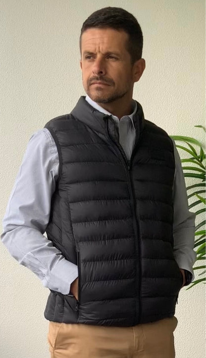 he Daniel Hechter Puffer Vest is a must have for your winter wardrobe. This stylish and functional outerwear piece is designed to provide warmth and comfort during cooler seasons. Crafted with attention to detail, this vest provides practicality with a sleek aesthetic.