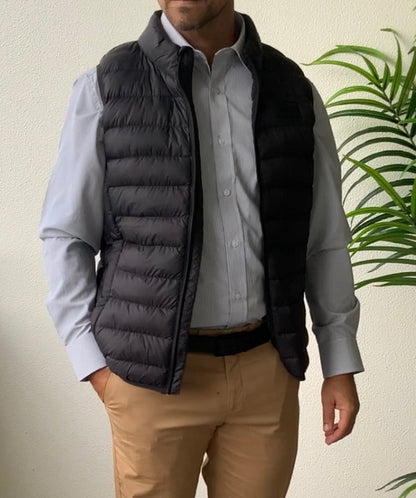 he Daniel Hechter Puffer Vest is a must have for your winter wardrobe. This stylish and functional outerwear piece is designed to provide warmth and comfort during cooler seasons. Crafted with attention to detail, this vest provides practicality with a sleek aesthetic.