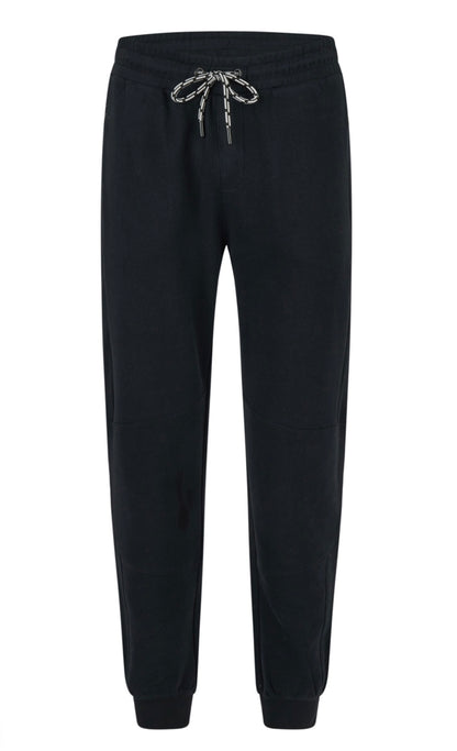 The perfect blend of casual comfort and sharp styling, the Daniel Hechter track pants are a go-to for relaxed days without sacrificing polish. Pair with the matching hoody or dress up with a crisp kennyk. tee and sneakers for elevated street style.

Tapered fit with ribbed ankle cuffs for a streamlined silhouette
Elastic waistband with adjustable drawcord for a personalised fit
Side pockets plus a discreet rear welt pocket for everyday essentials
Finished with a tonal Daniel Hechter logo for a clean modern 
