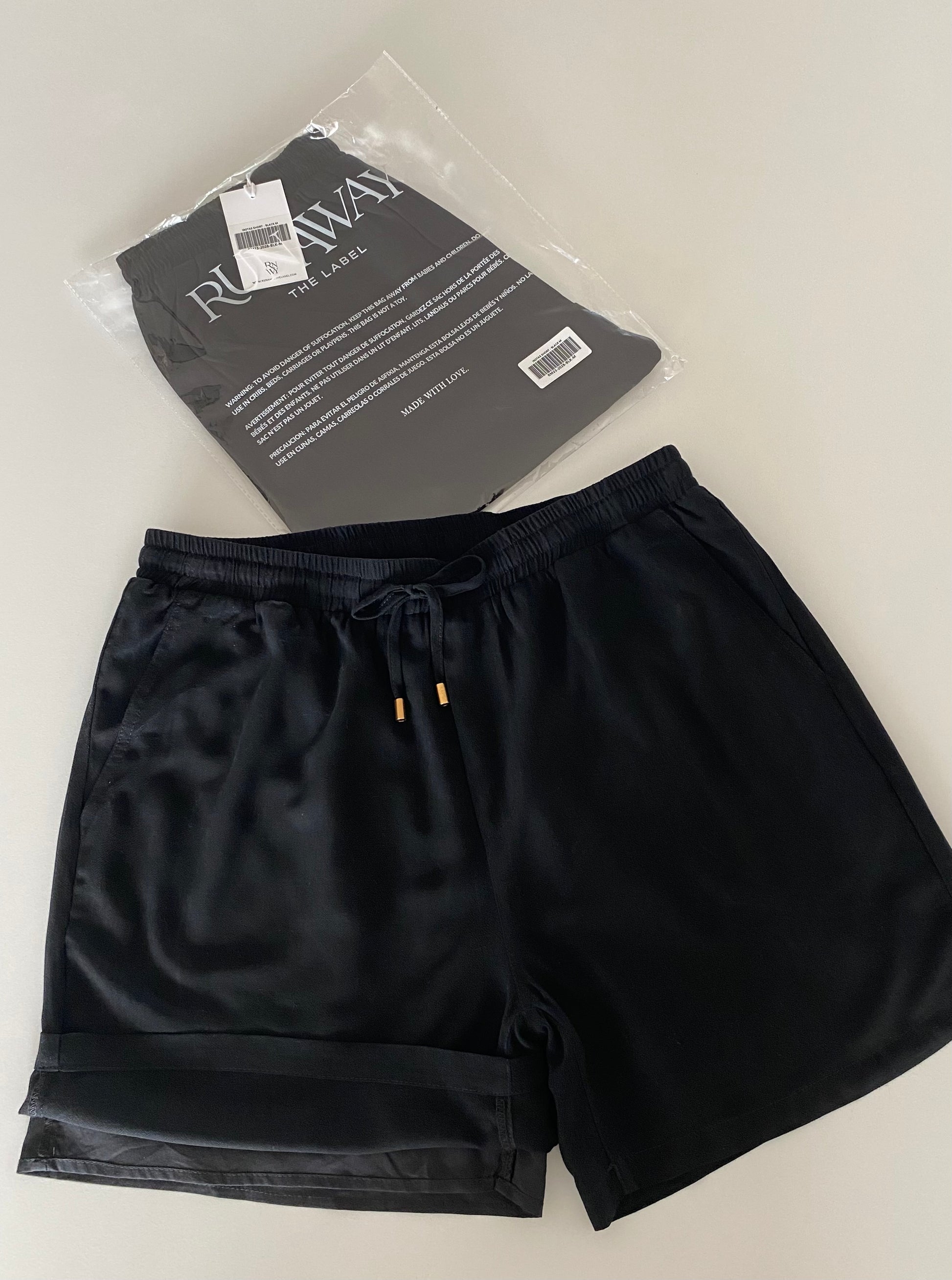 These shorts are truly made with Love, excellent quality and super comfortable. Great for those summer festivals or barbecues matched with a nice casual button up shirt or just awesome for lounging around at home with a kenny k. t-shirt. Elevate your style with the Irotas Leisure Short by RUNAWAY &amp; kenny k. This classic short is the perfect addition to any wardrobe, effortlessly combining comfort and style. Pair it with the matching kenny k. t-shirt for a complete and stylish look.

- Relaxed fit

- Ela