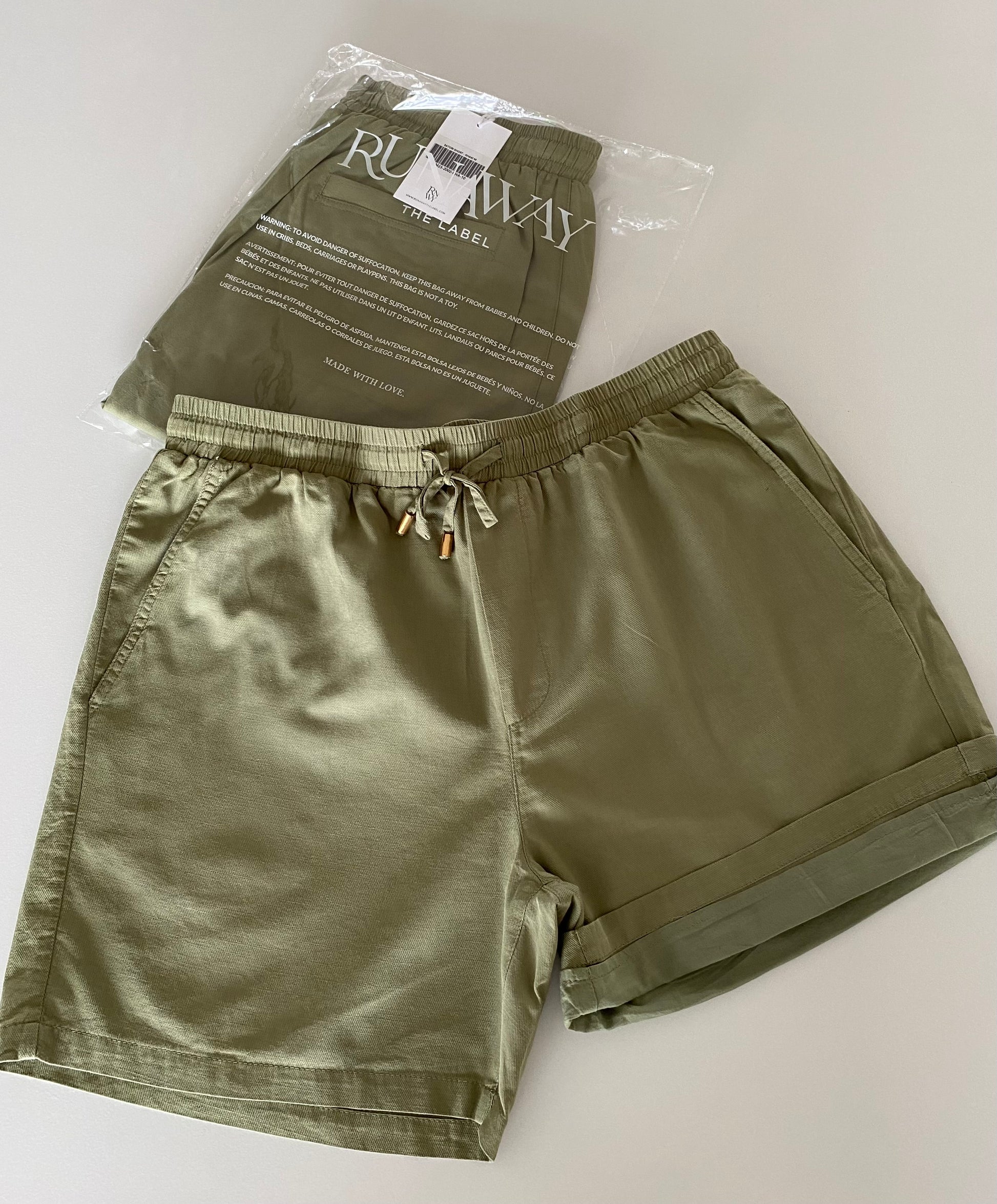 Elevate your style with the Irotas Leisure Short by RUNAWAY &amp; kenny k. This classic short is the perfect addition to any wardrobe, effortlessly combining comfort and style. Pair it with the matching kenny k. t-shirt for a complete and stylish look.

- Relaxed fit

- Elasticated waistband and drawstring&nbsp;

- Side and back pockets

- Lined with no stretch

- 100% Cotton

Please refer to care label for garment care instructions.