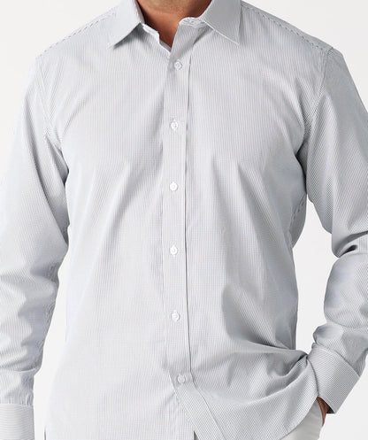 Classic style meets modern tailoring with Liberty black and white check business shirt. Designed for versatility and comfort, this shirt features a crisp check pattern that transitions effortlessly form the boardroom to after hours. Crafted from a breathable cotton/polyester blend, it delivers all day wearability with a polished, professional finish. The structured collar and button up design make it ideal for pairing with tailored trousers, chinos or layered under a blazer.

Black and White check pattern f