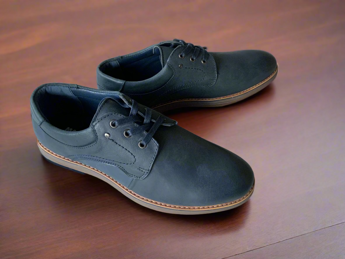 Crafted with a premium polished leather upper, this lace up dress shoe features a sleek almond toe, clean stitching detail and a slim, refined silhouette for a sophisticated finish. The cushioned inner sole delivers comfort from day to night, while the durable rubber outsole provides grip and stability with every step.