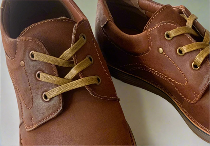 Command attention in the boardroom or at your next formal event with the Massa Maverick Dress Shoe, where classic design meets modern edge. Crafted with a premium polished leather upper, this lace up dress shoe features a sleek almond toe, clean stitching detail and a slim, refined silhouette for a sophisticated finish. The cushioned inner sole delivers comfort from day to night, while the durable rubber outsole provides grip and stability with every step.