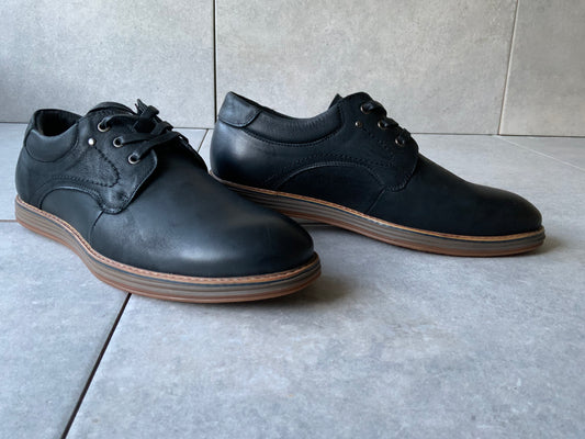 Command attention in the boardroom or at your next formal event with the Massa Maverick Dress Shoe, where classic design meets modern edge. Crafted with a premium polished leather upper, this lace up dress shoe features a sleek almond toe, clean stitching detail and a slim, refined silhouette for a sophisticated finish. The cushioned inner sole delivers comfort from day to night, while the durable rubber outsole provides grip and stability with every step.