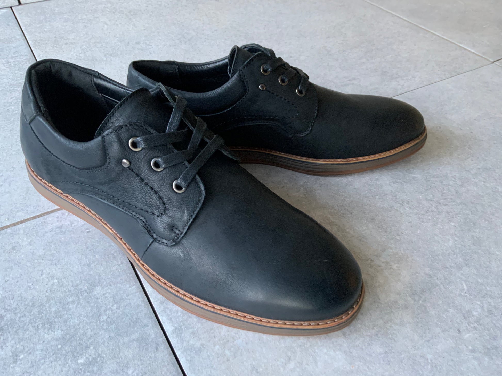 Command attention in the boardroom or at your next formal event with the Massa Maverick Dress Shoe, where classic design meets modern edge. Crafted with a premium polished leather upper, this lace up dress shoe features a sleek almond toe, clean stitching detail and a slim, refined silhouette for a sophisticated finish. The cushioned inner sole delivers comfort from day to night, while the durable rubber outsole provides grip and stability with every step.