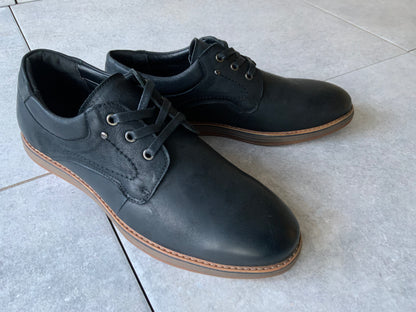 Command attention in the boardroom or at your next formal event with the Massa Maverick Dress Shoe, where classic design meets modern edge. Crafted with a premium polished leather upper, this lace up dress shoe features a sleek almond toe, clean stitching detail and a slim, refined silhouette for a sophisticated finish. The cushioned inner sole delivers comfort from day to night, while the durable rubber outsole provides grip and stability with every step.