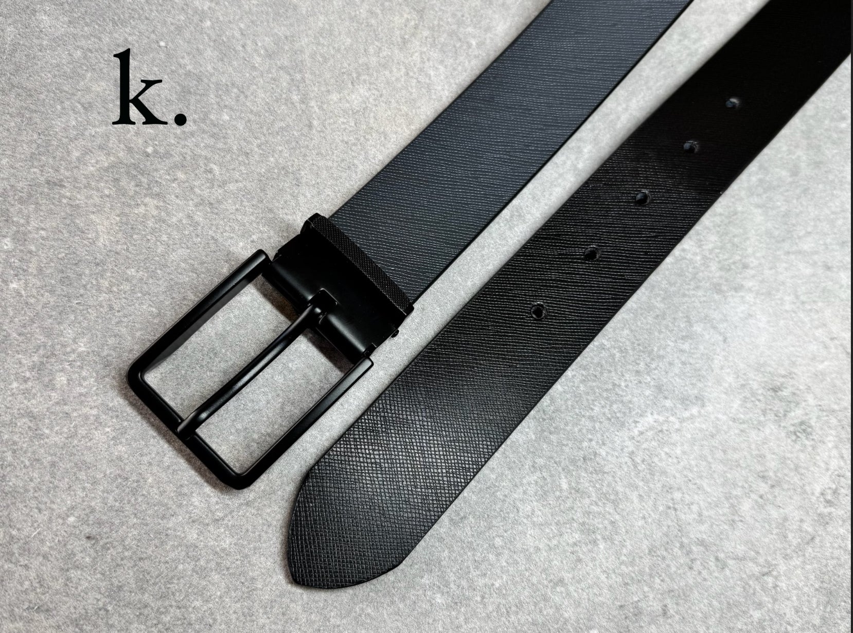 Complete your outfit with this must-have Parker Avenue men’s reversible leather belt, brought to you by kennyk. The perfect blend of style, function and versatility. Crafted from durable synthetic leather with a polished finish this two-in-one dress belt adds a sophisticated touch to any look.

Sleek rotating buckle for easy colour change from black to brown or black to grey to match your shoes
Stylish and durable synthetic leather construction
Classic polished metal hardware