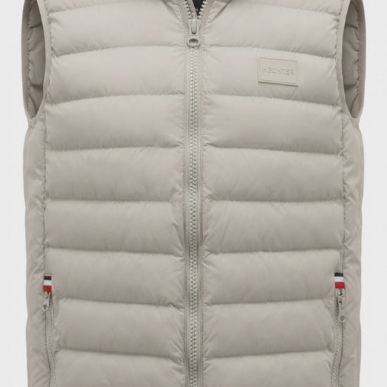 The Daniel Hechter Puffer Vest is a must have for your winter wardrobe. This stylish and functional outerwear piece is designed to provide warmth and comfort during cooler seasons. Crafted with attention to detail, this vest provides practicality with a sleek aesthetic.

100% Polyester
Stand up collar
Full length zip closure
Zippered side pockets and additional internal pockets
Brought to you by kenny k.