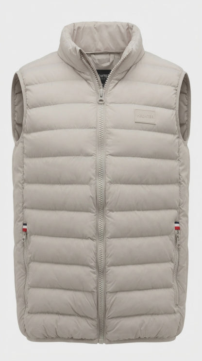 The Daniel Hechter Puffer Vest is a must have for your winter wardrobe. This stylish and functional outerwear piece is designed to provide warmth and comfort during cooler seasons. Crafted with attention to detail, this vest provides practicality with a sleek aesthetic.

100% Polyester
Stand up collar
Full length zip closure
Zippered side pockets and additional internal pockets
Brought to you by kenny k.